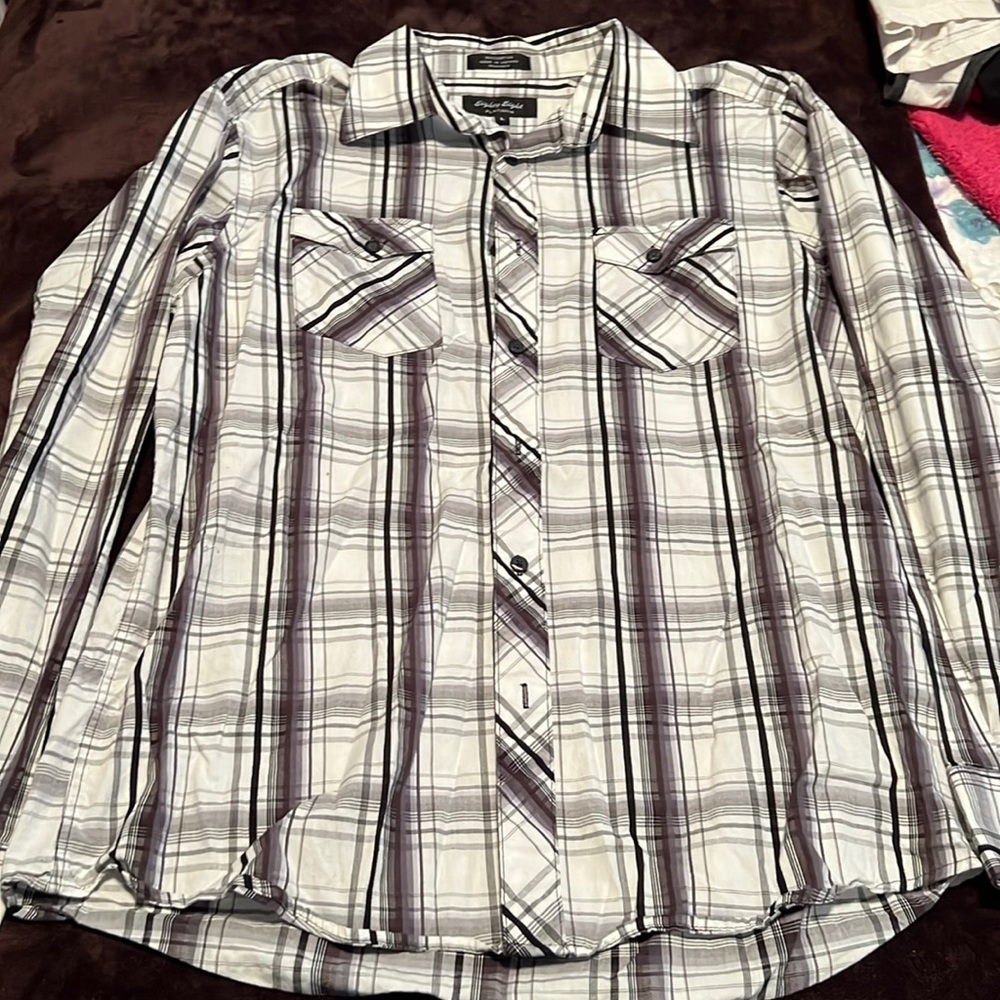 Men’s black and white plaid dress shirt with the front pockets